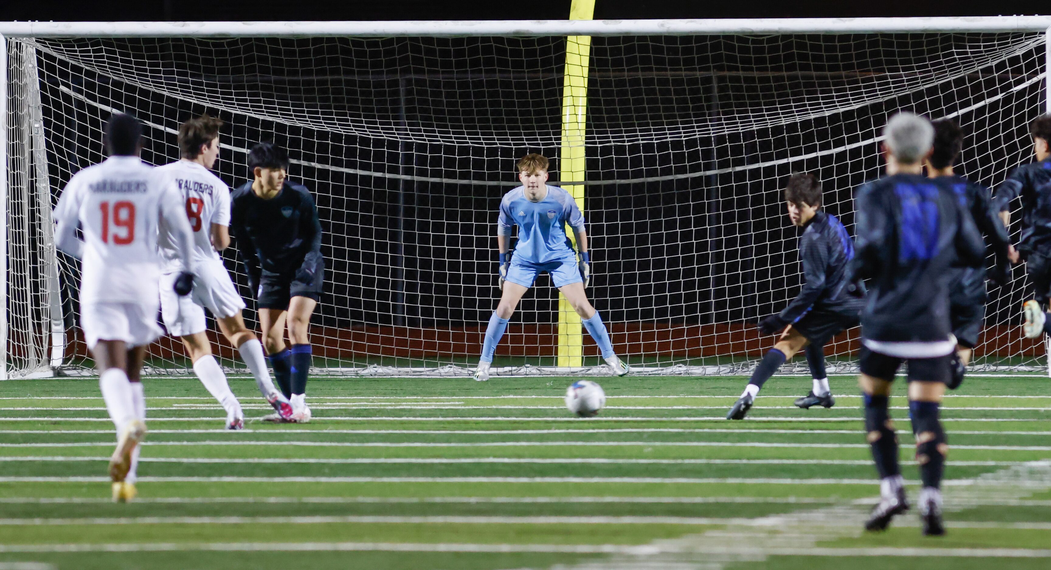 Hebron goalkeeper Evan Mayhaw (1) prepares for an incoming ball during a game against Flower...