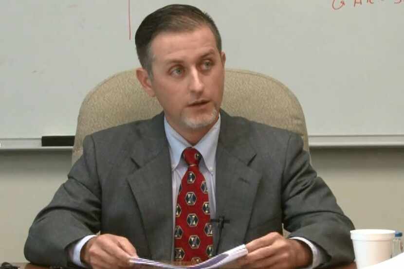 Forensic scientist Chris Youngkin testifies during a deposition in Collin County last year.