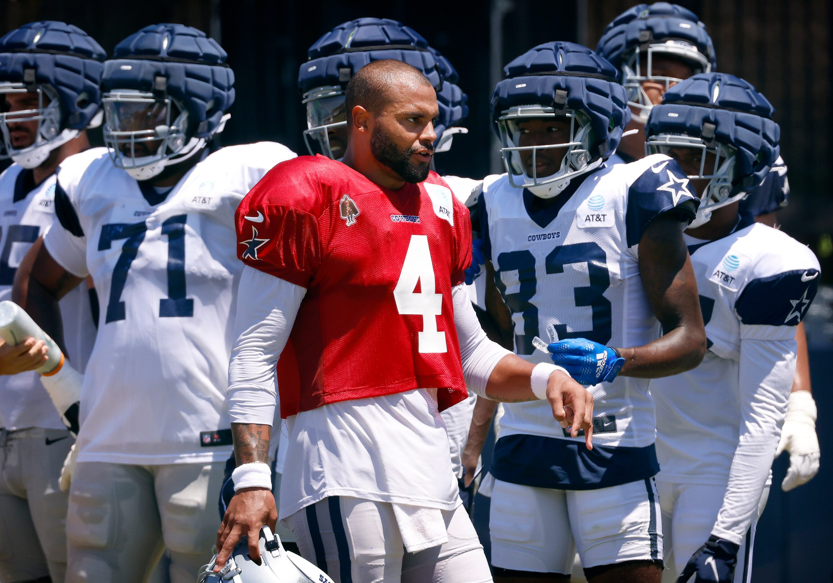 Dallas Cowboys quarterback Dak Prescott (4) and his first team offense wait their turn to...