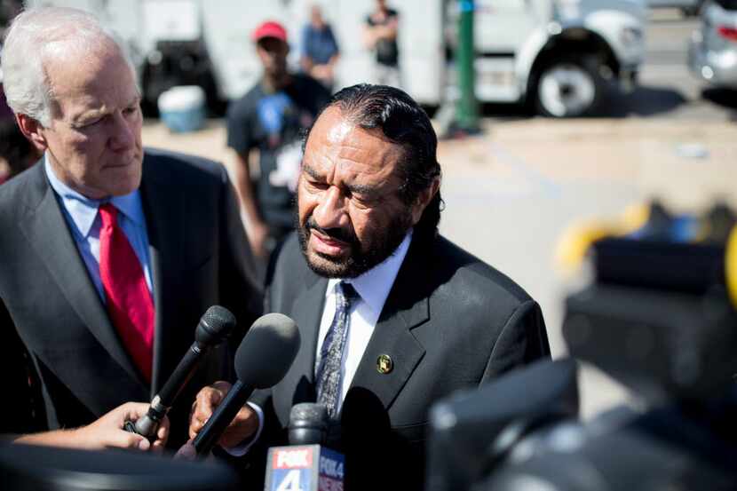Rep. Al Green, D-Houston, speaks at y the memorial outside of the Dallas Police Headquarters...