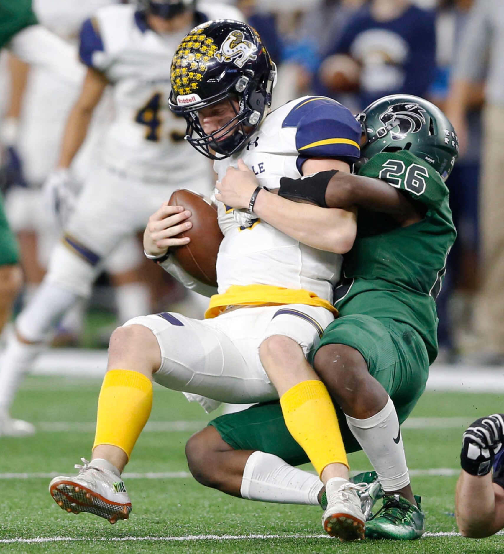 Kennedale's Jalen Myers (26) sacks Stephenville's Easton Jones (3) during the first half of...