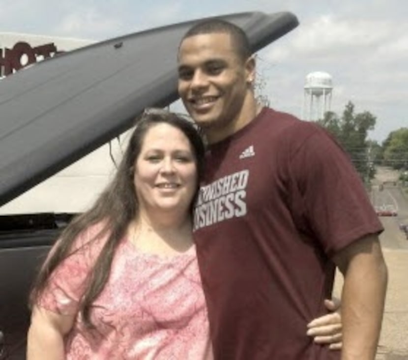 MSU QB Dak Prescott with his mom, Peggy Prescott. submitted by the family in December of 2012.