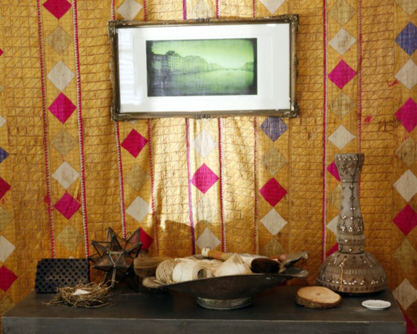 Spools of string and twine in a tarnished silver bowl symbolize a stories past to the stylist.