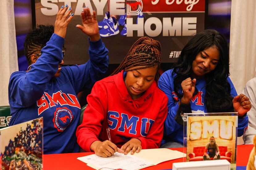 DeSoto basketball player Jiya Perry signs her national letter of intent with SMU on...