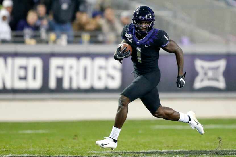 TCU Horned Frogs wide receiver Jalen Reagor (1) takes long stride as he breaks away for a...