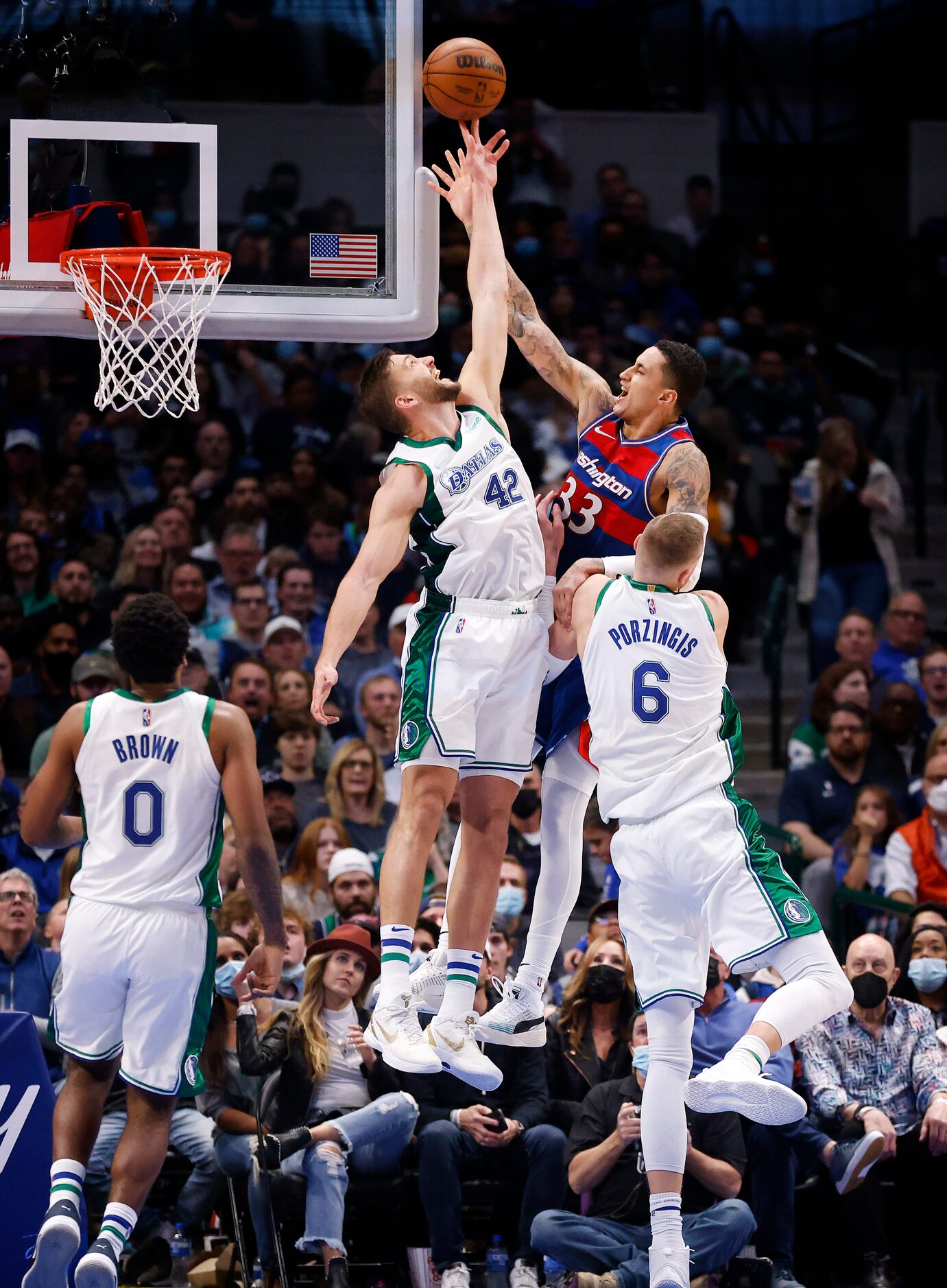 Dallas Mavericks forward Maxi Kleber (42) goes high to block a fourth quarter shot by...