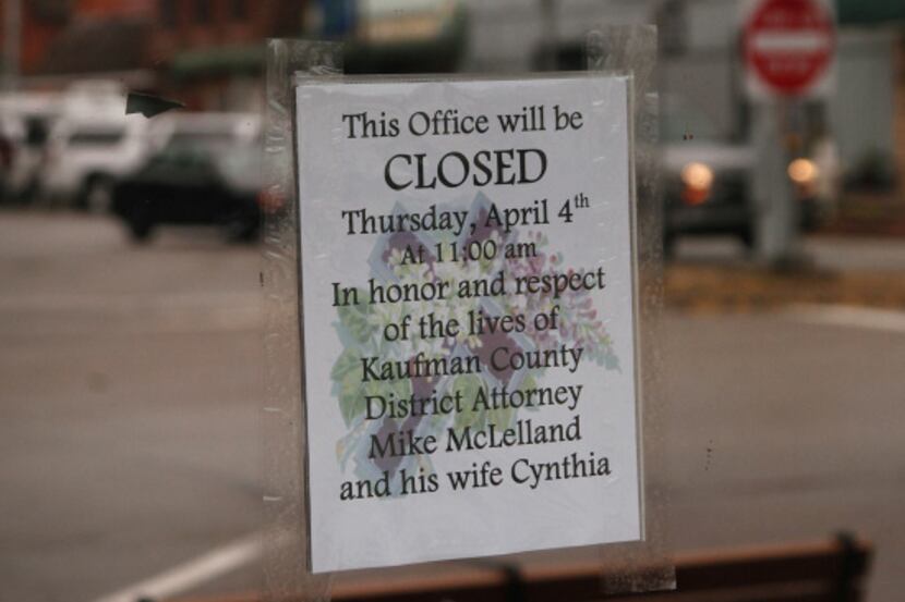 A sign alluding to the funeral for Mike McLelland and his wife, Cynthia, was posted on the...