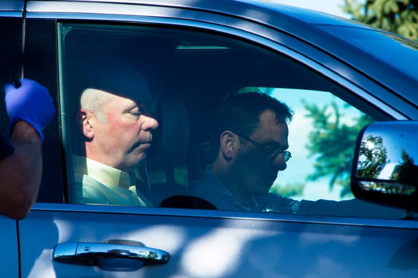 Republican candidate for Montana's only U.S. House seat, Greg Gianforte, sits in a vehicle...