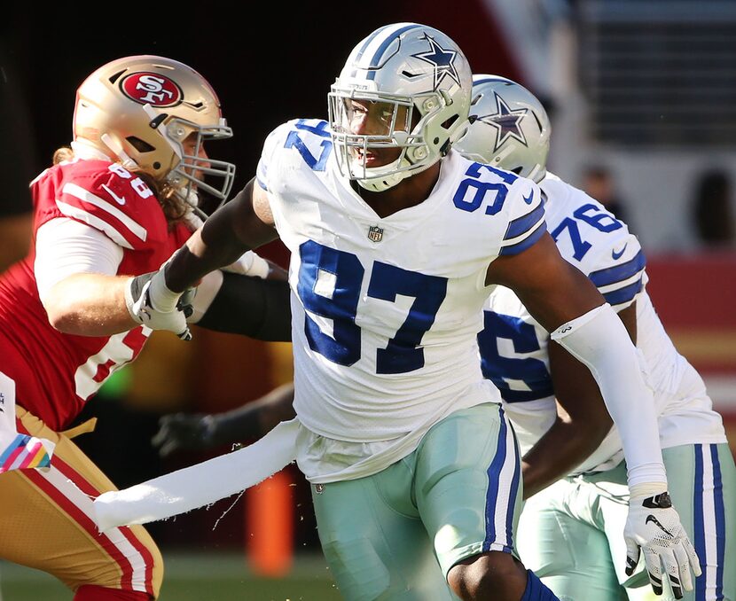 Dallas Cowboys defensive end Taco Charlton (97) runs during a play in the second half Dallas...