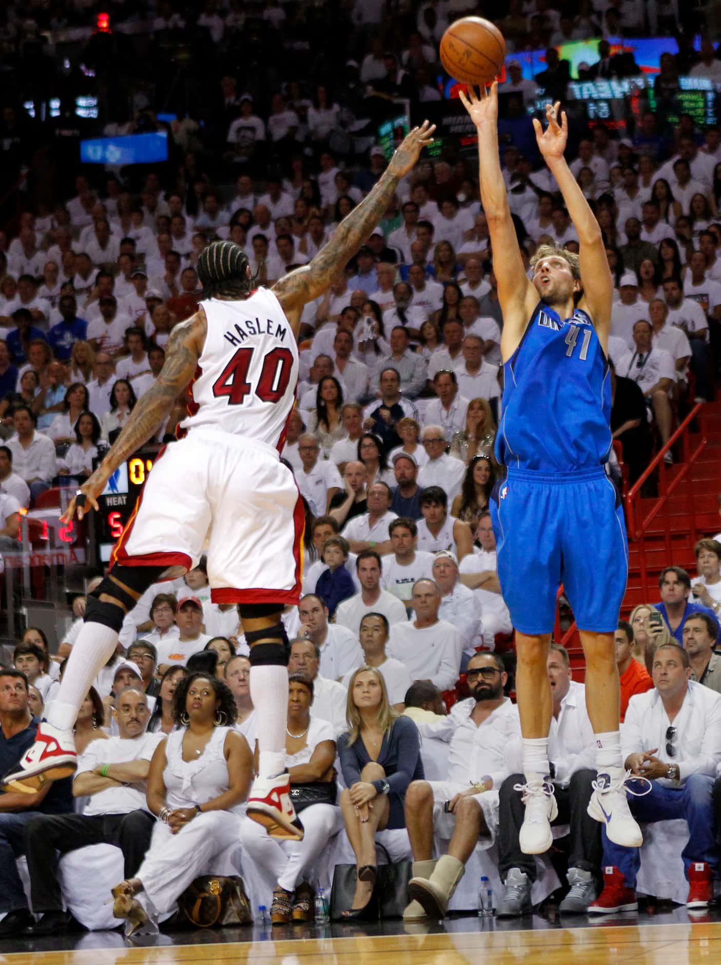 Dallas Mavericks power forward Dirk Nowitzki (41) puts up a three pointer against Miami Heat...