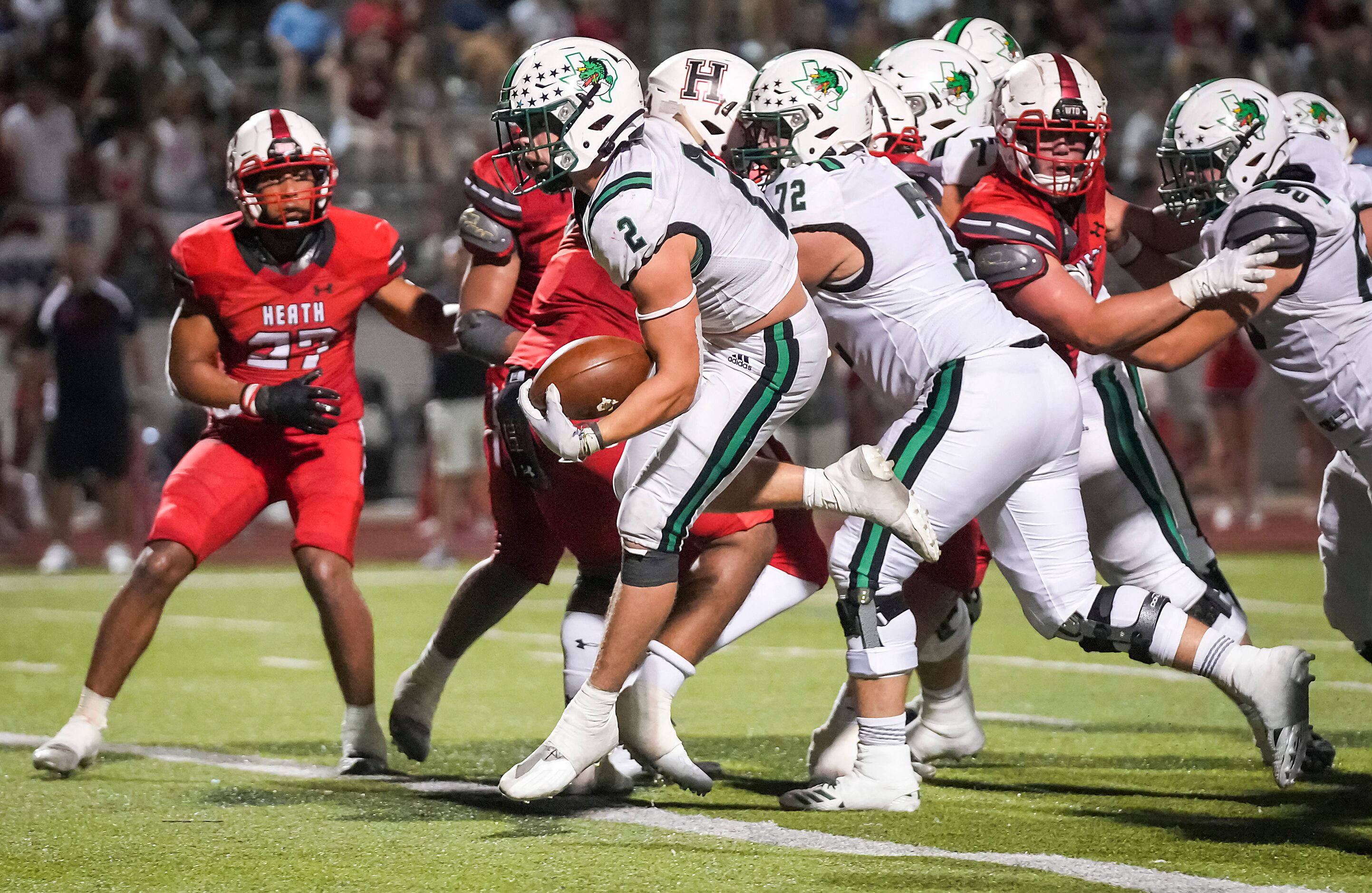 Southlake Carroll running back Owen Allen (2) scores on a 4-yard touchdown run to give the...