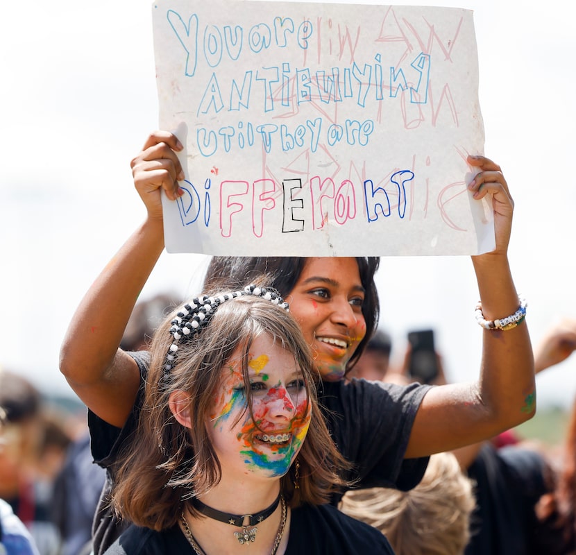 Grapevine High School students, including sophomore Evelyn Phillips, front, and Josephine...