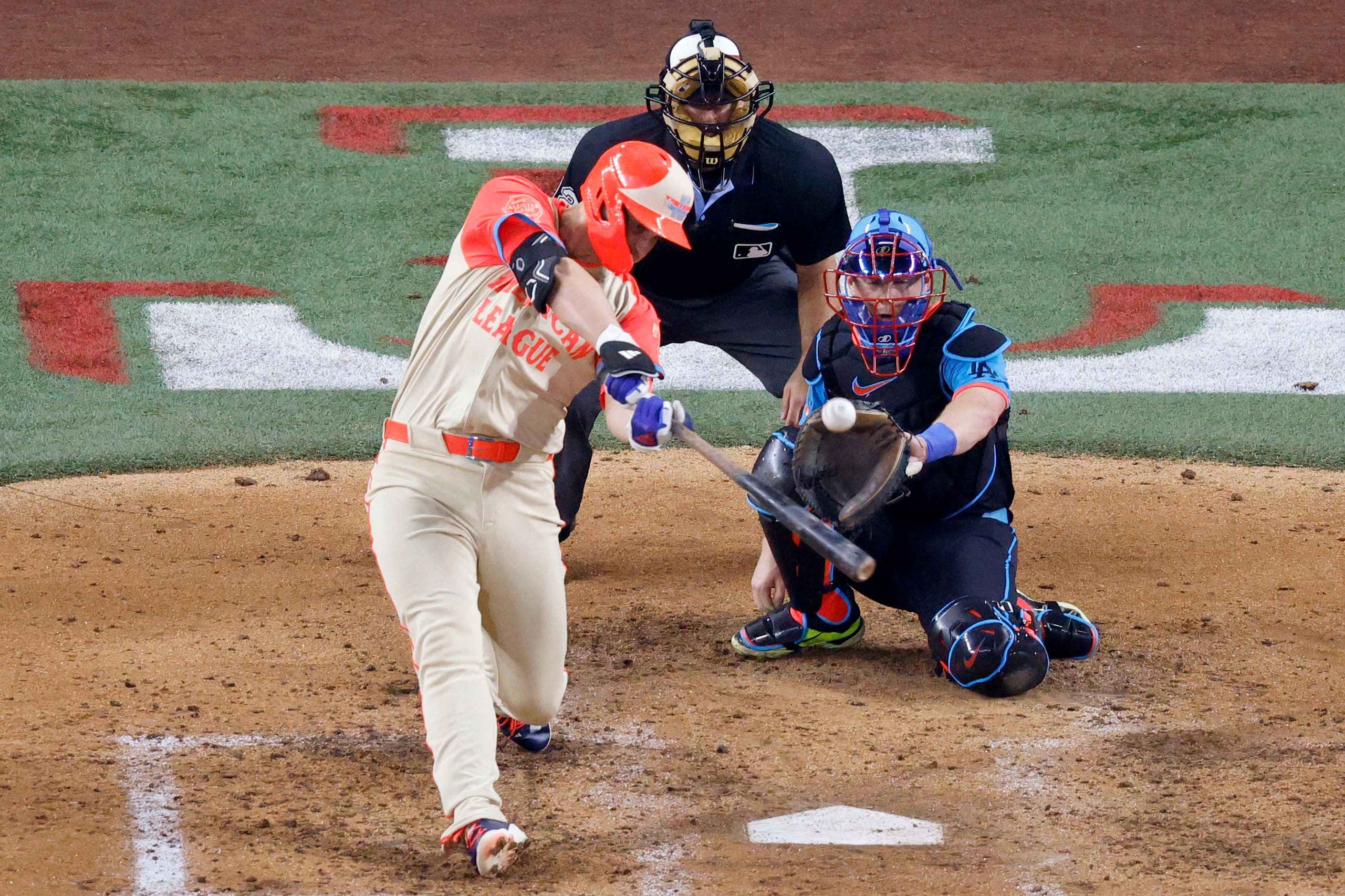 American League's Corey Seager of Texas Rangers (5) hits a fly during the fifth inning of...