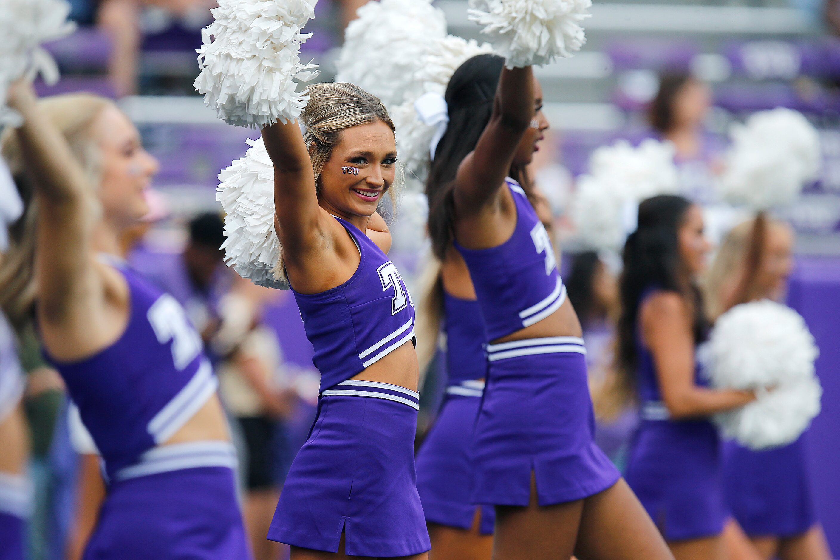 TCU cheerleaders wait for their team to take the field before kickoff as the TCU Horned...