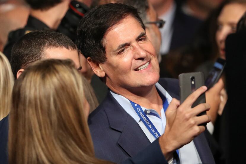 Mavericks owner Mark Cuban poses for a selfie before the presidential debate between...