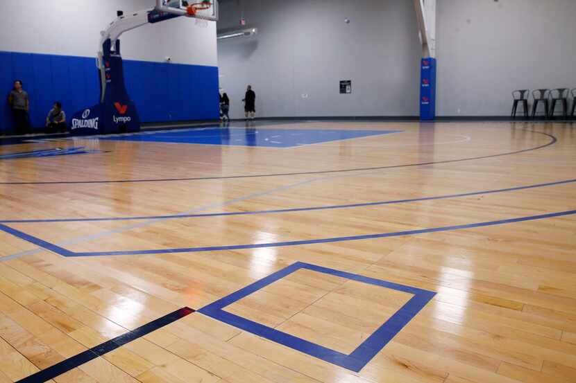 Extended lines and squares are seen past the three point line on the practice court during...
