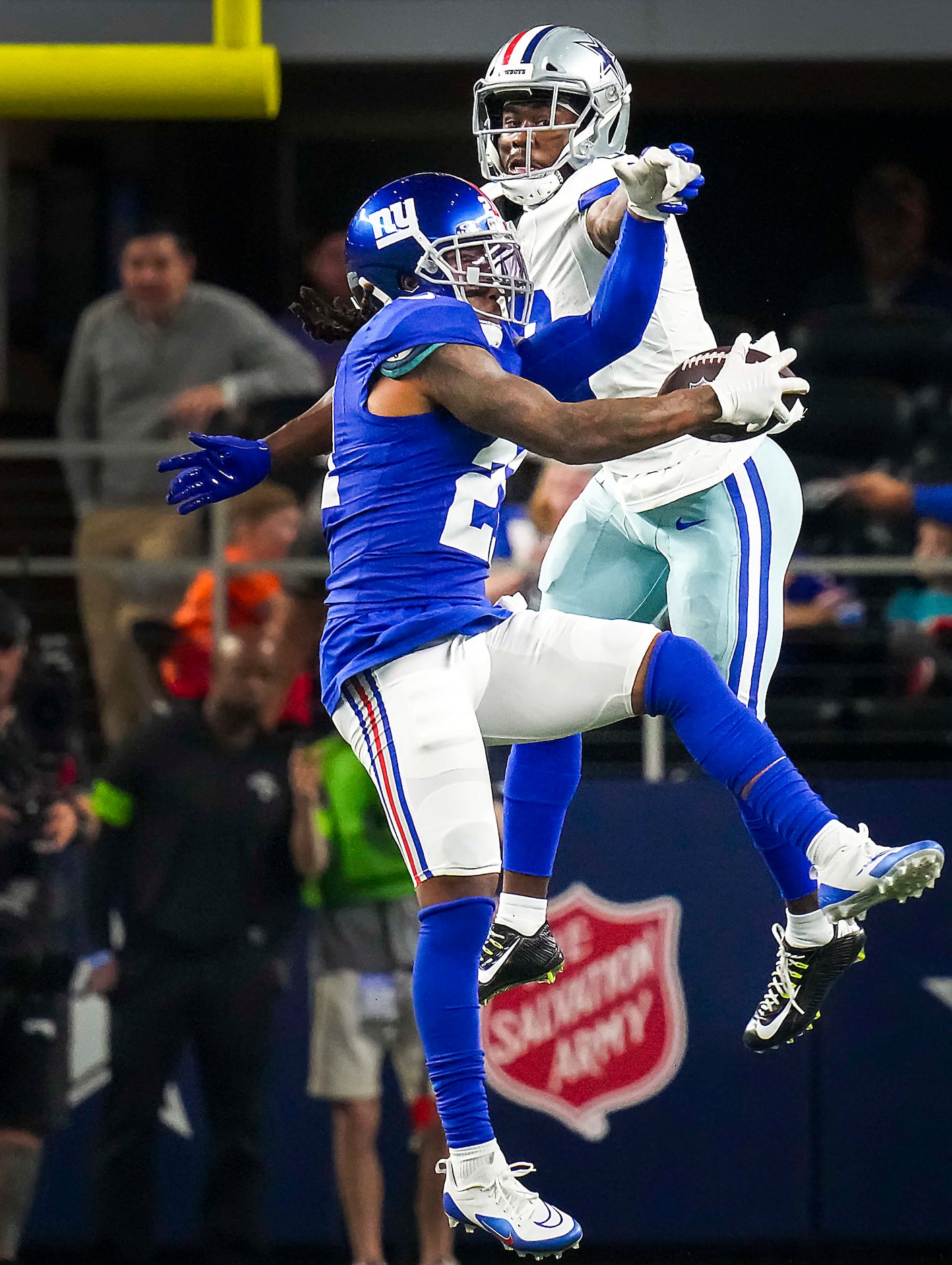 New York Giants safety Bobby McCain (21) breaks up a pass intended for Dallas Cowboys wide...