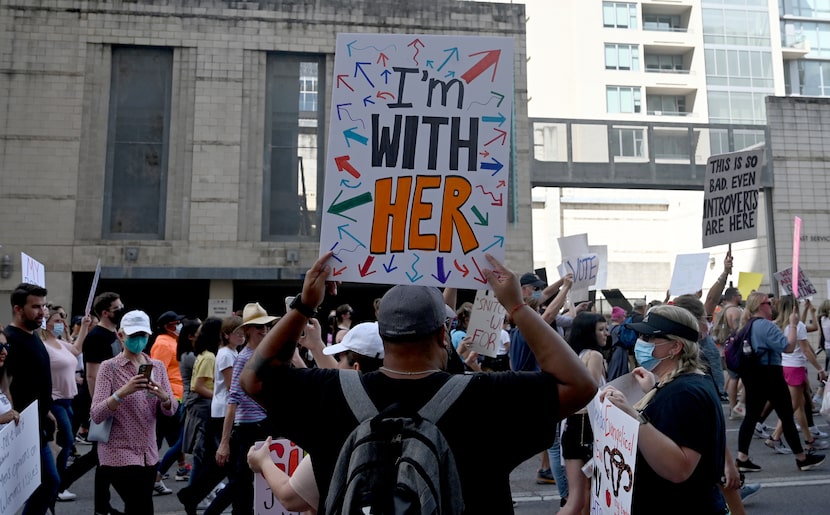 Abortion-rights demonstrators marched down Commerce Street and several other streets to...