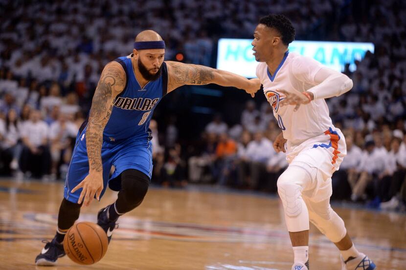 Apr 18, 2016; Oklahoma City, OK, USA; Dallas Mavericks guard Deron Williams (8) drives to...