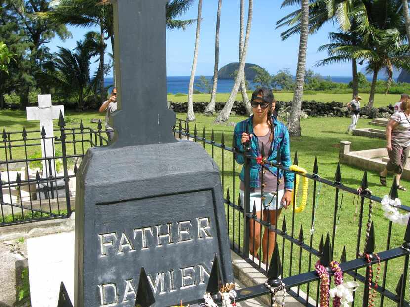 
Visitors can see the grave of Father Damien, a 19th century Belgian priest who ministered...