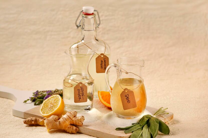 Summer simple syrups  made with sugar (from left) lemon ginger, lavender orange and sage.