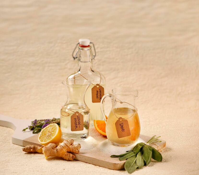 Summer simple syrups  made with sugar (from left) lemon ginger, lavender orange and sage.