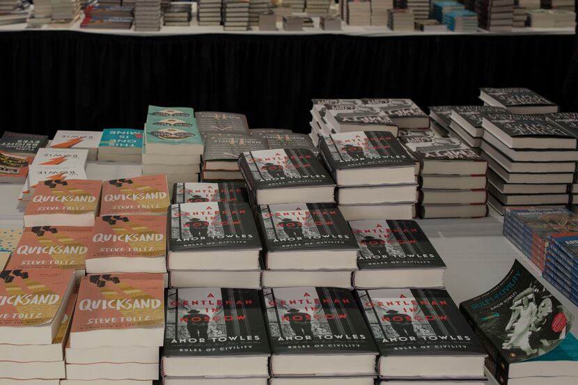 In this 2016 file photo, books are piled high inside the Barnes and Noble tent at the Texas...