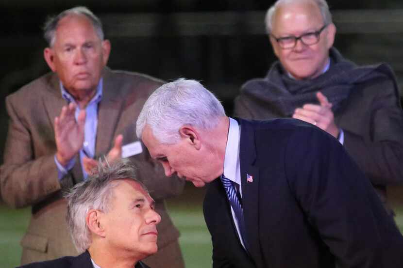 United States Vice President Mike Pence shakes hands with Texas Governor Greg Abbott at a...