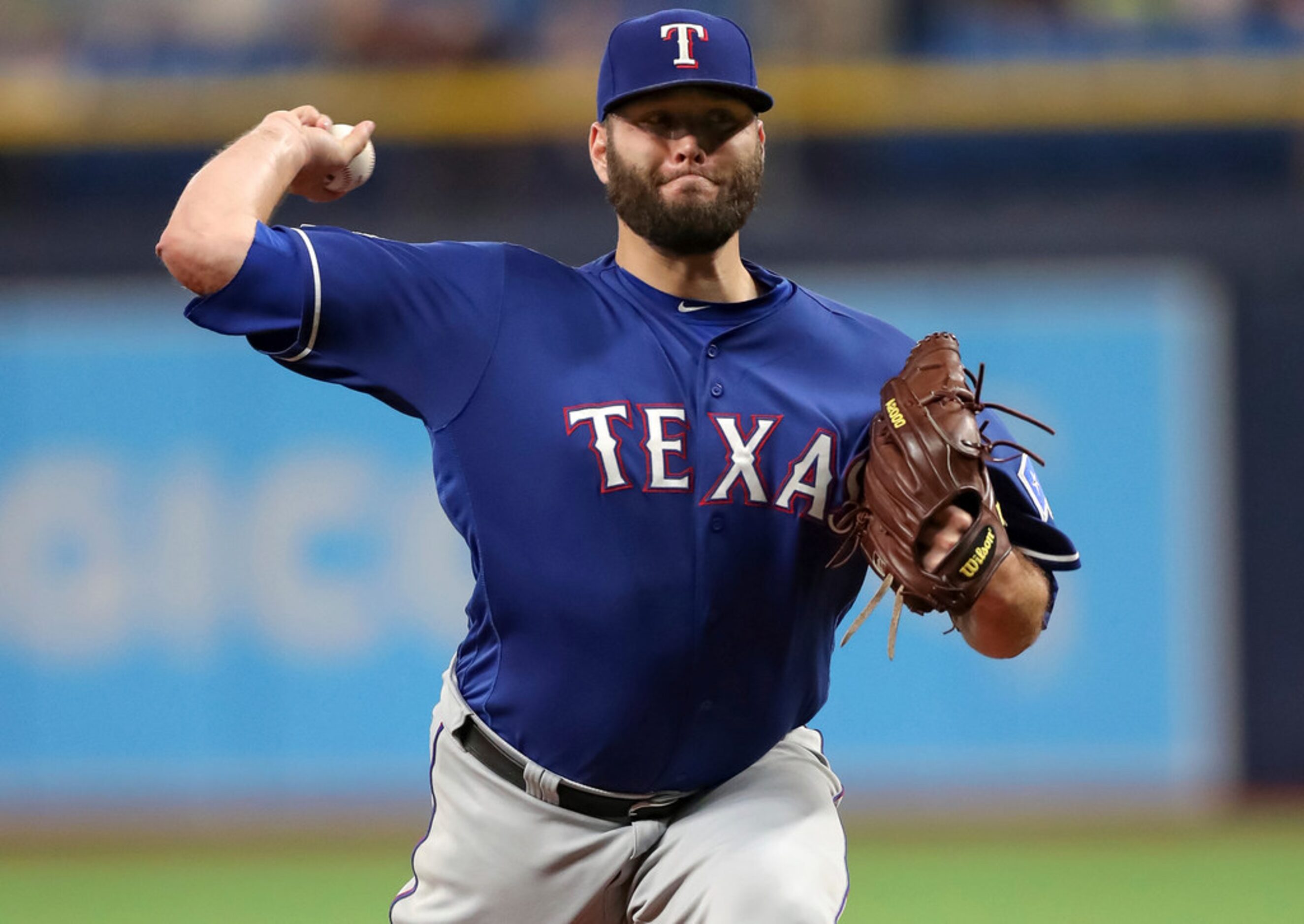 Texas Rangers starting pitcher Lance Lynn throws during the first inning of the team's...