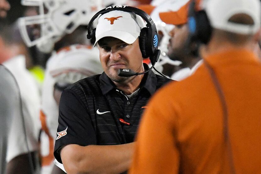 FILE - In this Sept. 16, 2017, file photo, Texas coach Tom Herman stands on the sideline...