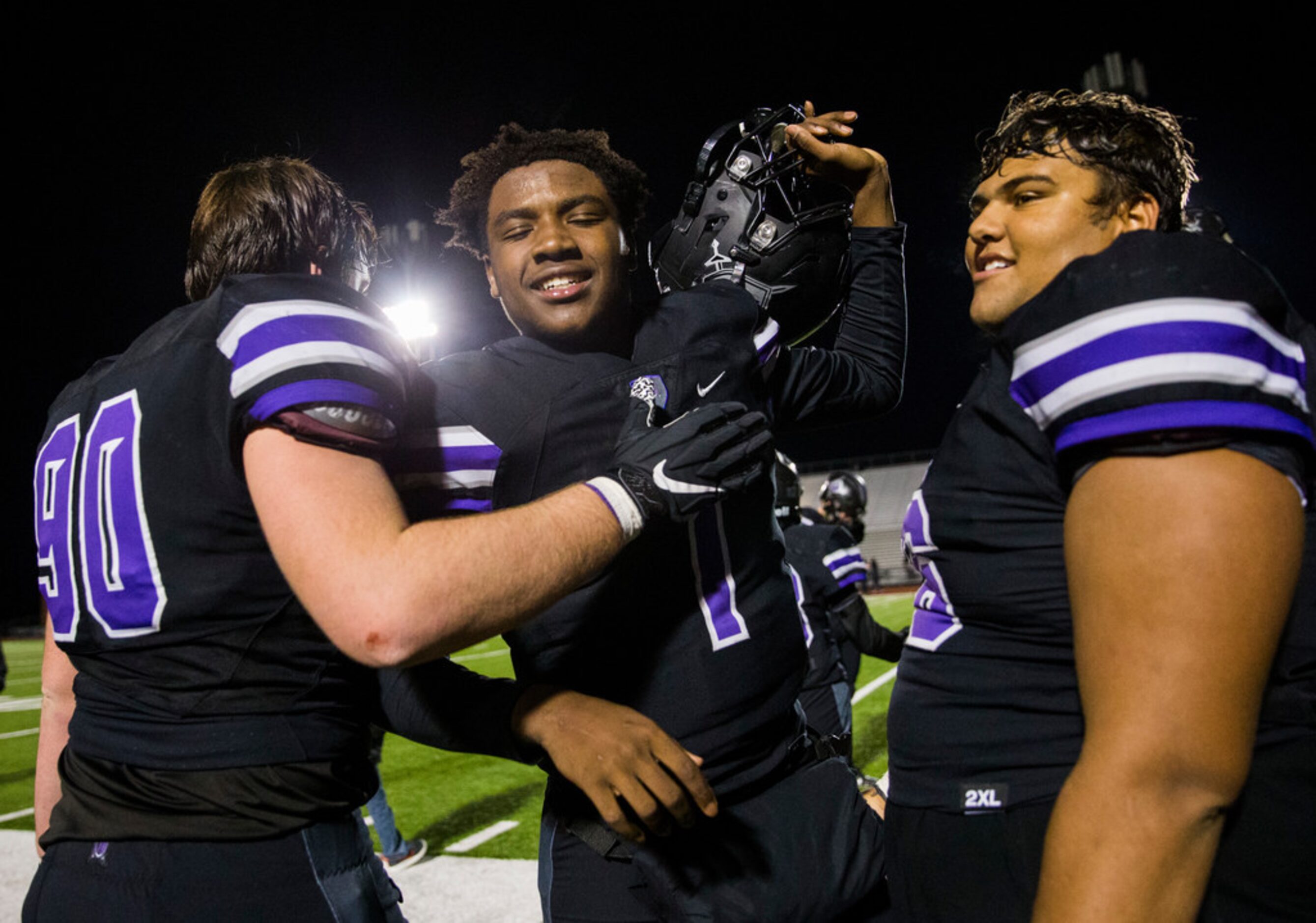 Frisco Independence quarterback Braylon Braxton (1) celebrates with his team after a UIL...