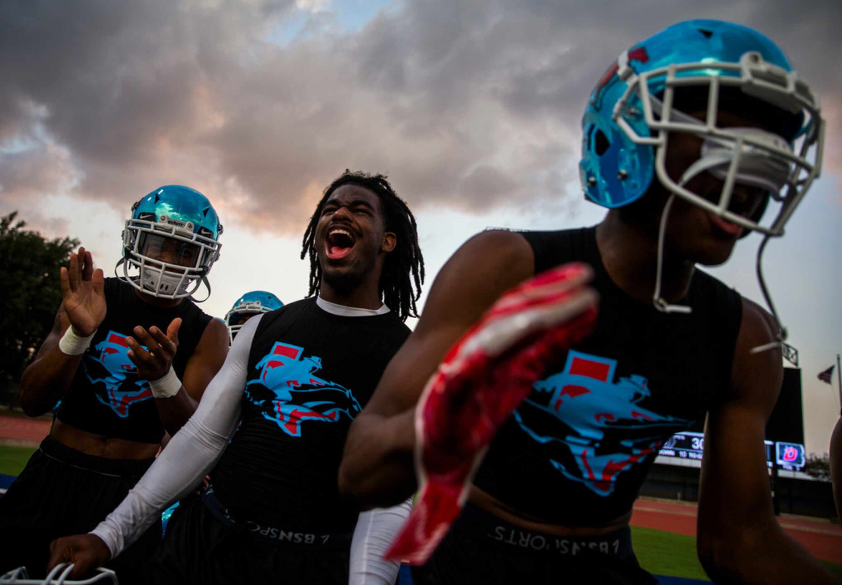 Skyline football players get hyped up before a high school football game between Skyline and...