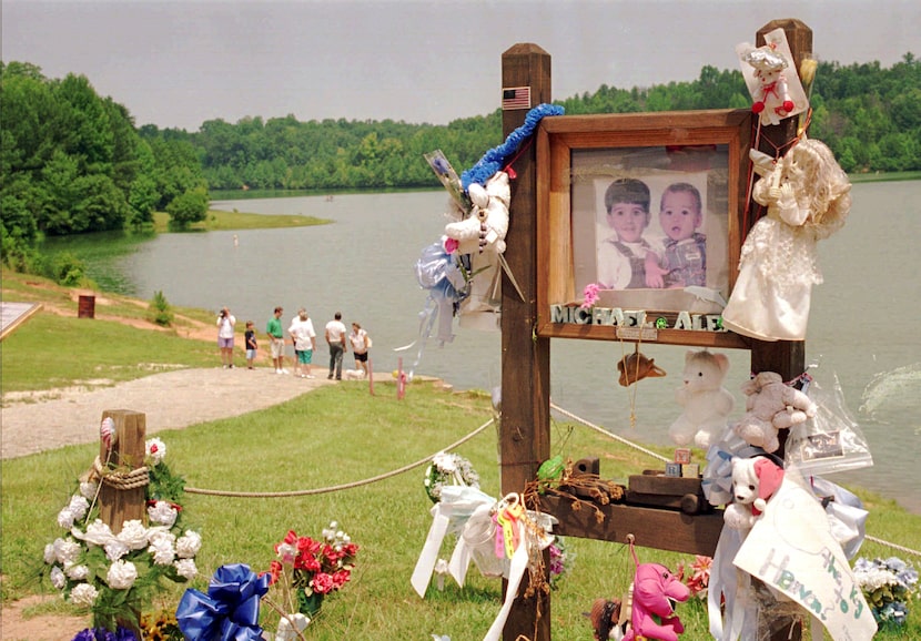 FILE - In a July 9, 1995 file photo, visitors walk down the ramp where Alex and Michael...