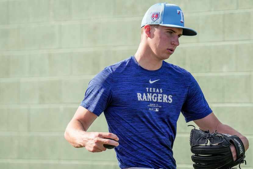 Texas Rangers minor league pitcher Brock Porter participates in a spring training workout on...
