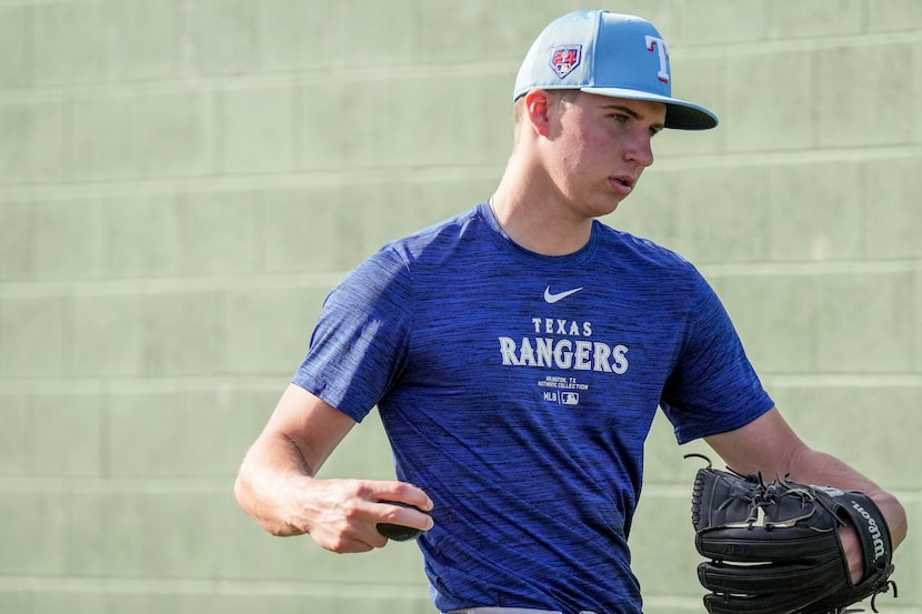 Texas Rangers minor league pitcher Brock Porter participates in a spring training workout on...