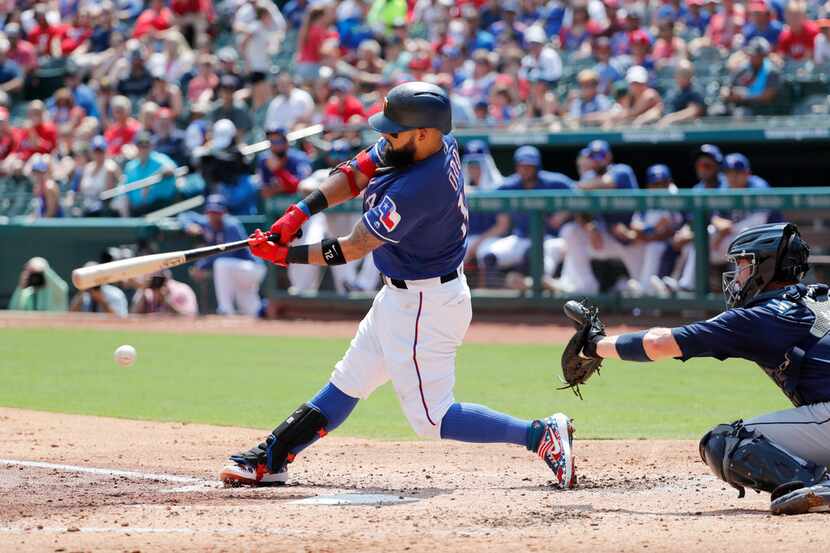 Texas Rangers' Rougned Odor follows through on a ground out that scored Delino DeShields...