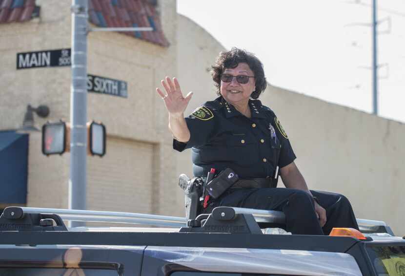 Dallas County Sheriff Lupe Valdez rode atop a Hummer in Garland's annual Labor Day Parade on...