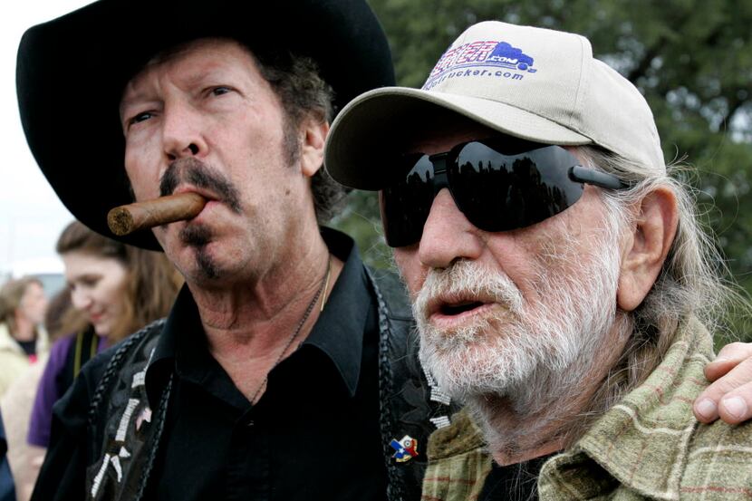 ORG XMIT: *S0419039732* Independent gubernatorial candidate Kinky Friedman, left, and...