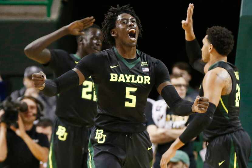 Baylor forward Johnathan Motley (5) reacts to a play against Texas in first half of an NCAA...
