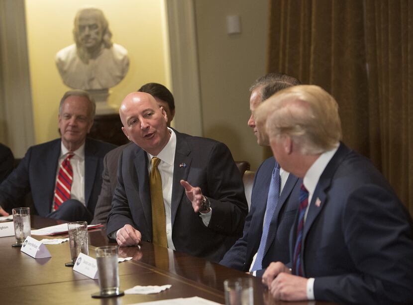 Nebraska Gov. Pete Ricketts spoke to President Donald Trump during a meeting on trade with...