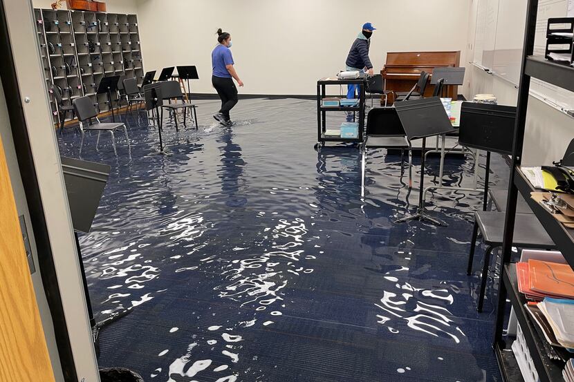 A band room is severely damaged with water after a pipe busted during the winter storm at...