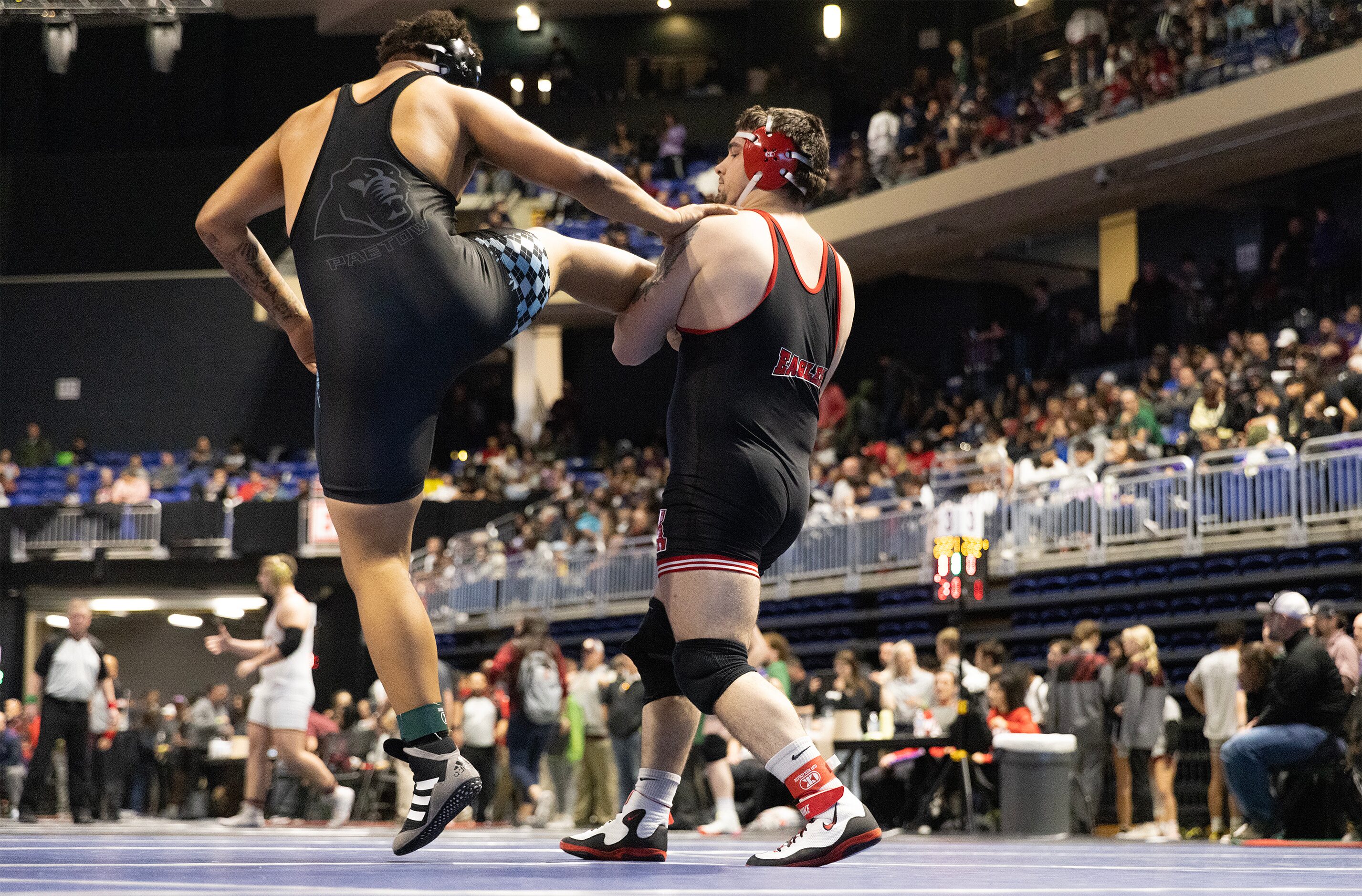 Drake Madole from Allen (right) wrestles Jarra Anderson from Katy Paetow in the 6A boys 285...