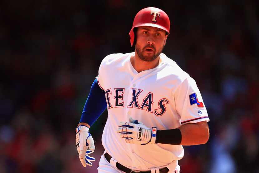 ARLINGTON, TX - APRIL 09:  Joey Gallo #13 of the Texas Rangers runs the bases after hitting...