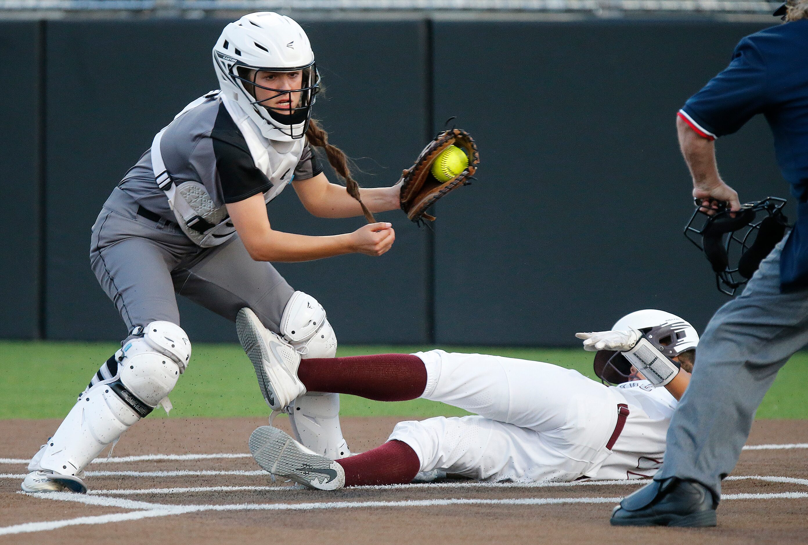 Denton Guyer High School catcher Jordan Osborne (8) was unable to get the tag in time on...