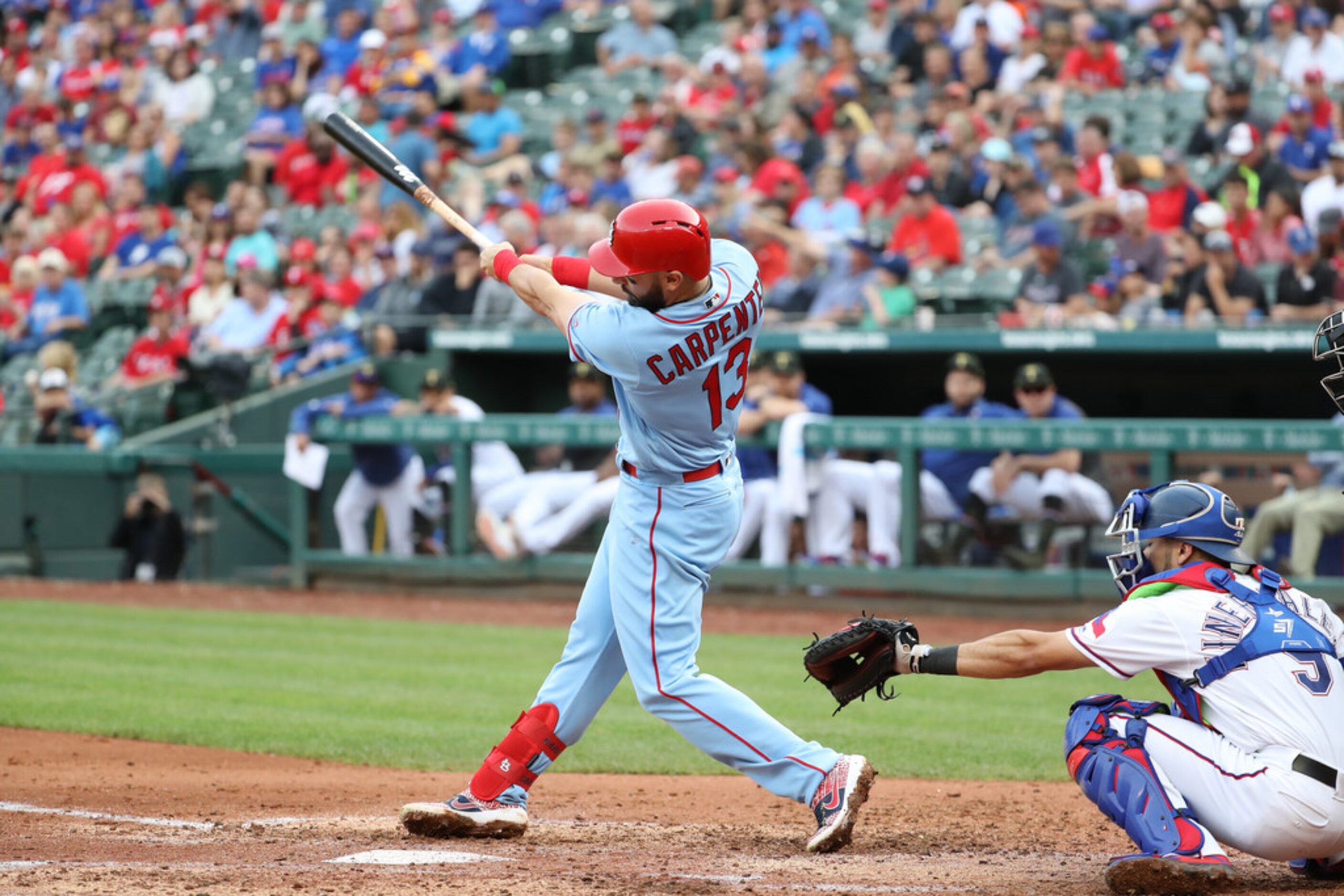 ARLINGTON, TEXAS - MAY 18:  Matt Carpenter #13 of the St. Louis Cardinals hits a rbi double...