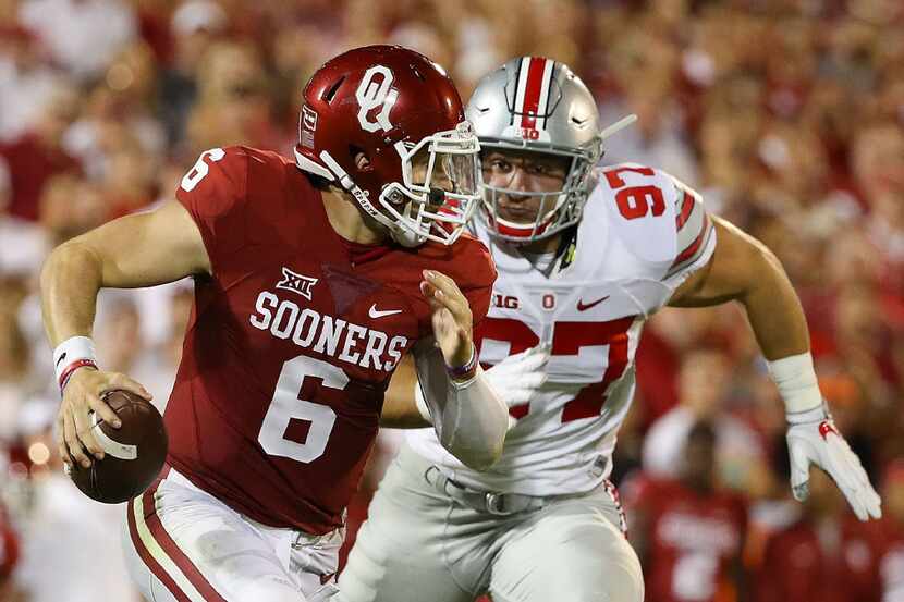 NORMAN, OK - SEPTEMBER 17:  Baker Mayfield #6 of the Oklahoma Sooners runs out of the pocket...