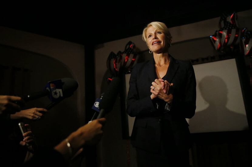  Susan Hawk gives a speech to supporters after winning the race for Dallas County District...
