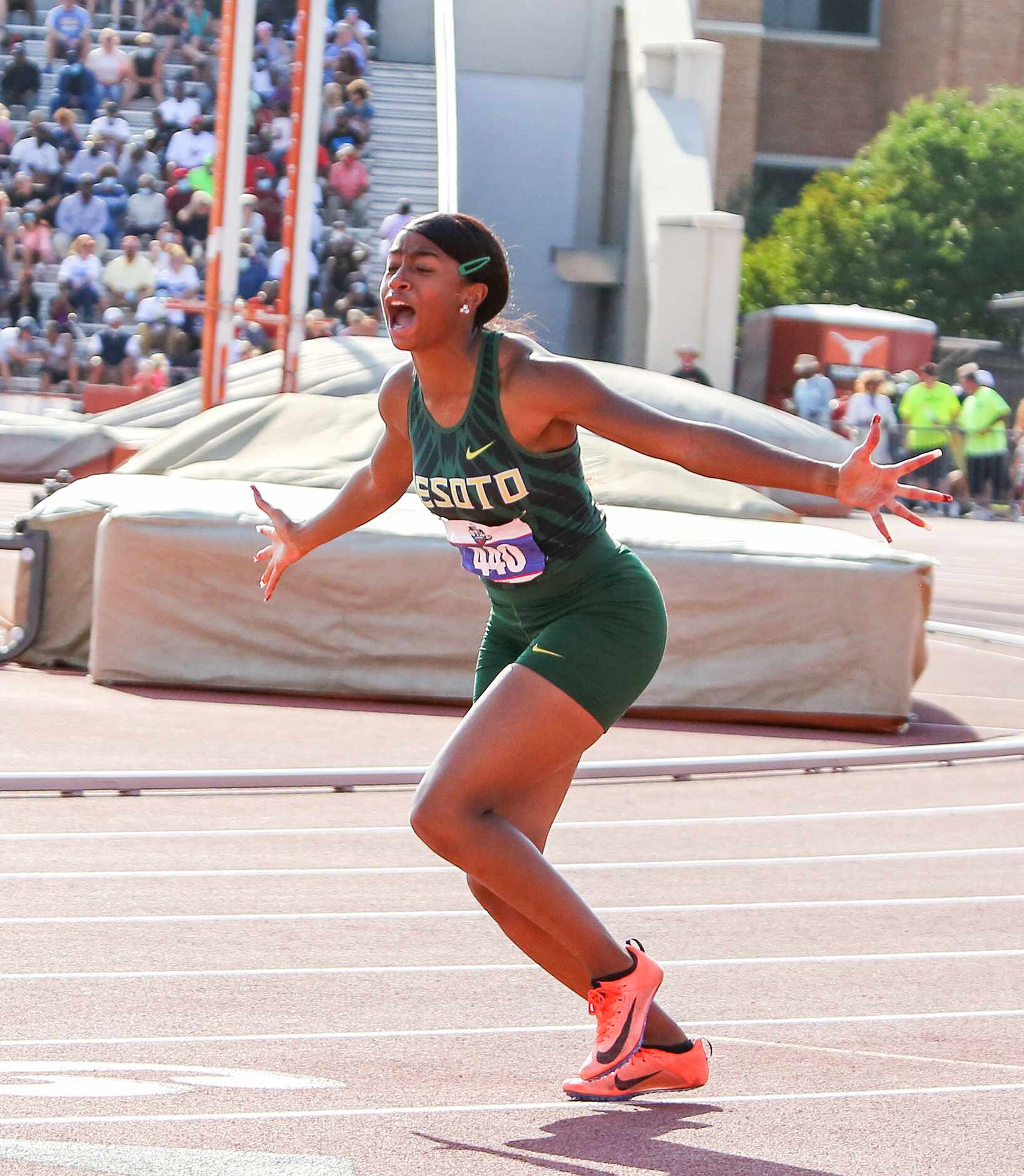 DeSoto's Jalaysi'ya Smith reacts to placing first in the 6A Girls 100 meter hurdles during...