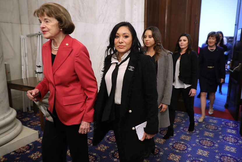 Former champion gymnast Jeanette Antolin (center), with Sen. Dianne Feinstein, took part in...