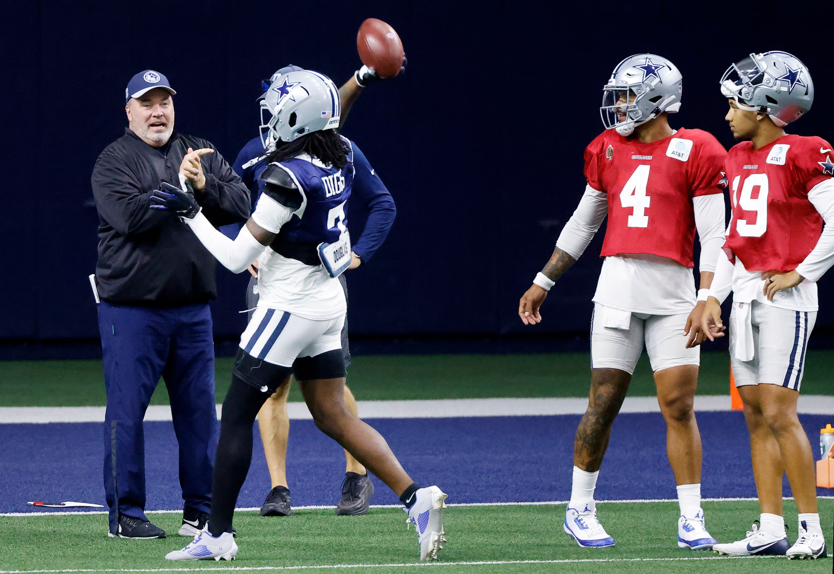 Dallas Cowboys cornerback Trevon Diggs (7) tries his arm at quarterback as head coach Mike...